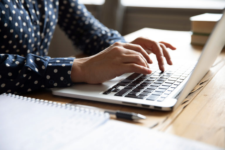 Close,Up,Image,Female,Hands,Typing,On,Laptop,Keyboard